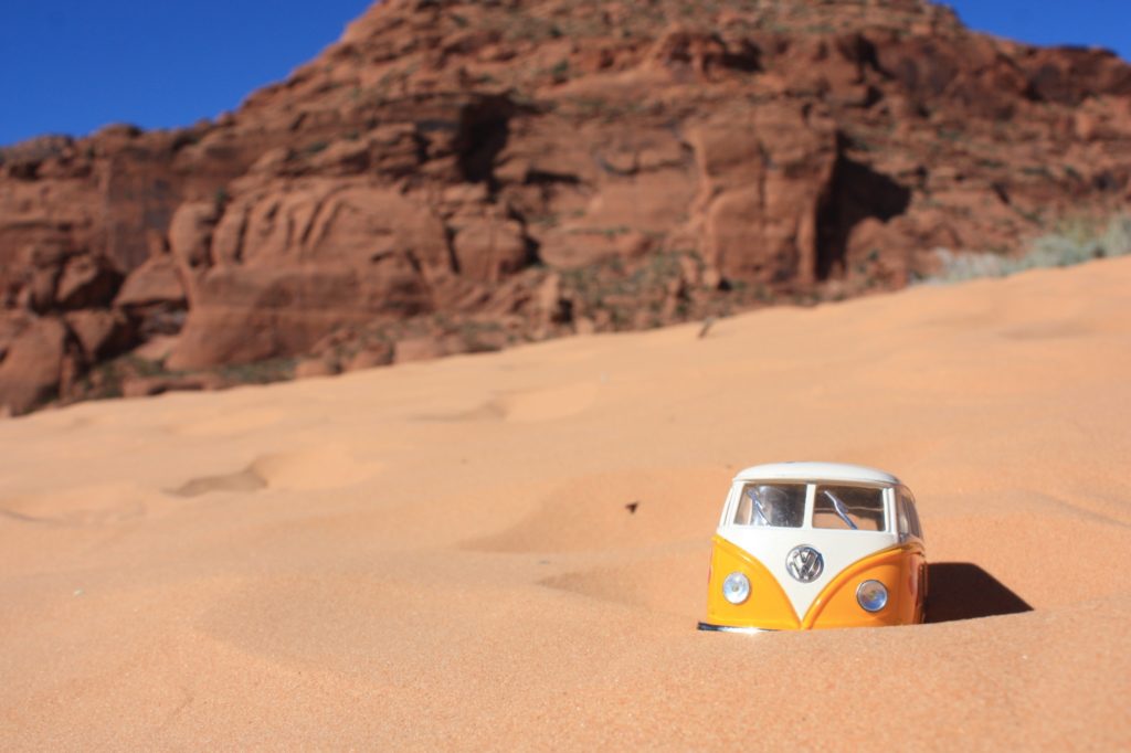 Yellow Van on a sand dune