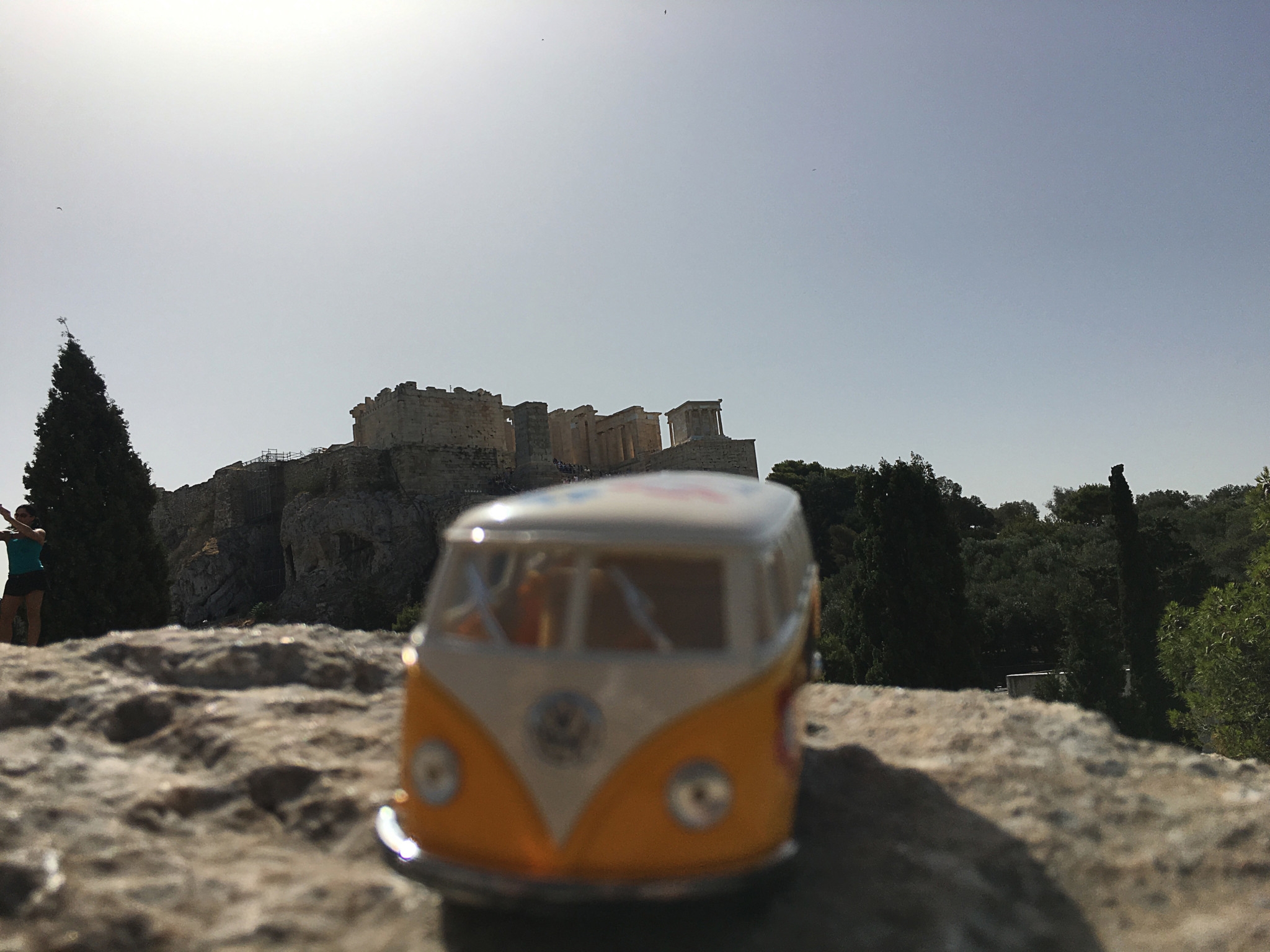 Yellow van on Mars Hill in front of the Acropolis