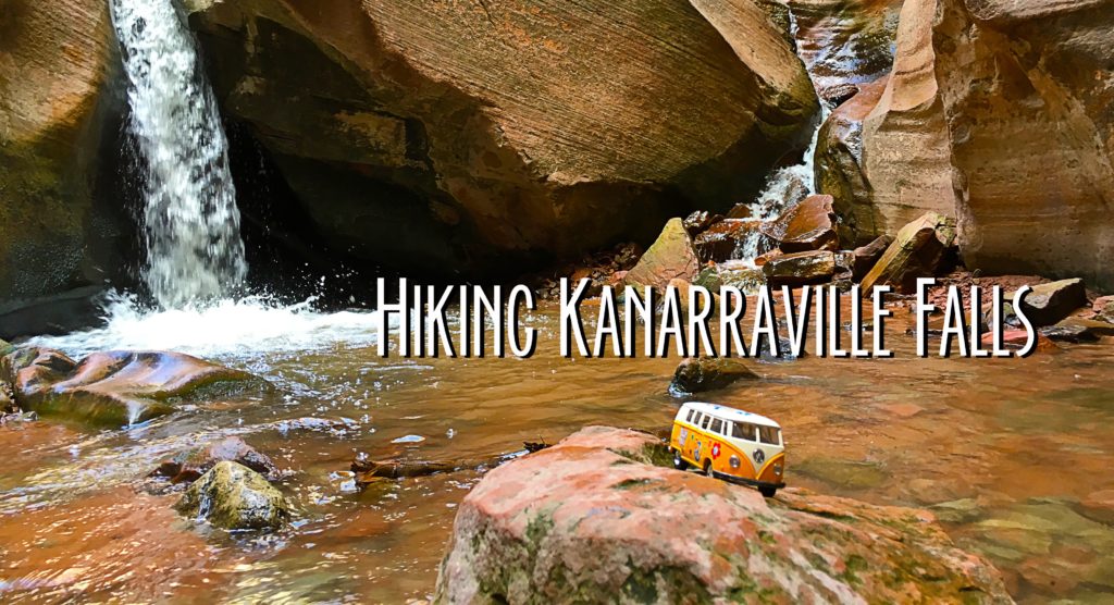 Title card showing the yellow van in front of a 15 foot waterfall 