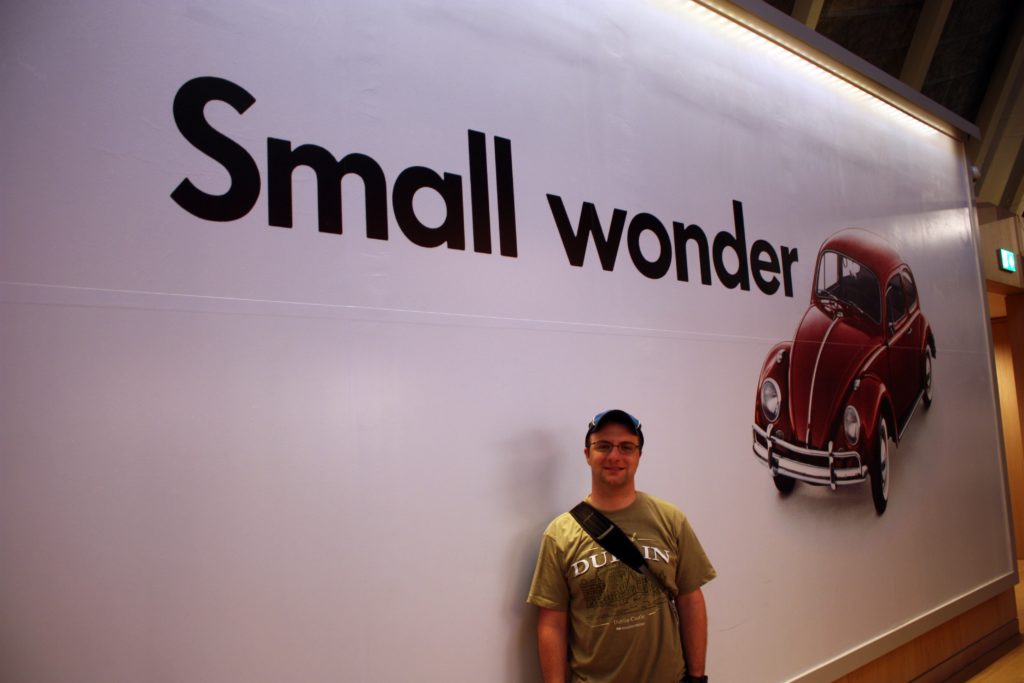 Ben with a Volkswagen ad at the Design Museum in London