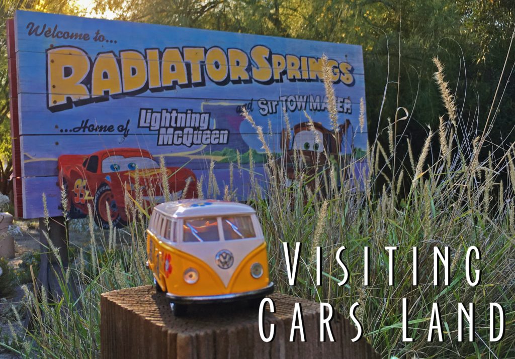 Title Card showing yellow van with Cars Land Sign