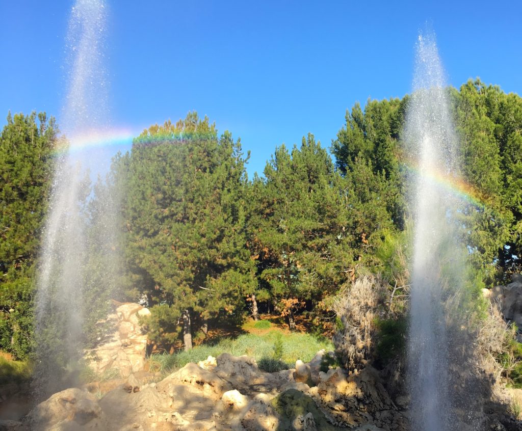 A rainbow across the geysers at Grizzly River Run