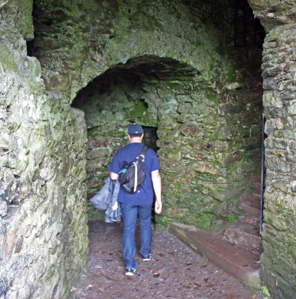 Ben in the dungeons of Blarney Castle