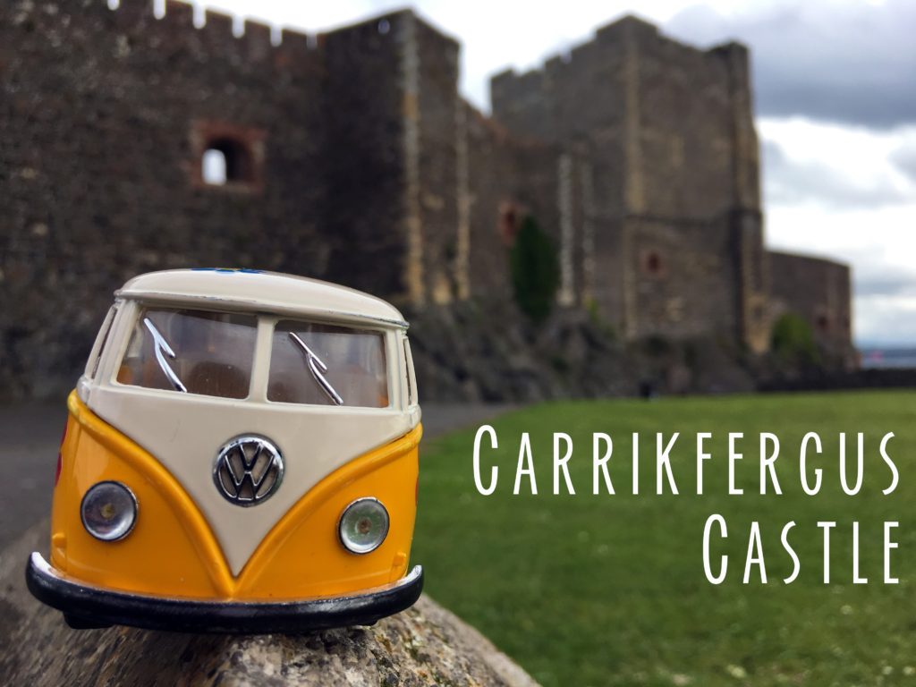 A title card showing the yellow van and Carrickfergus Castle