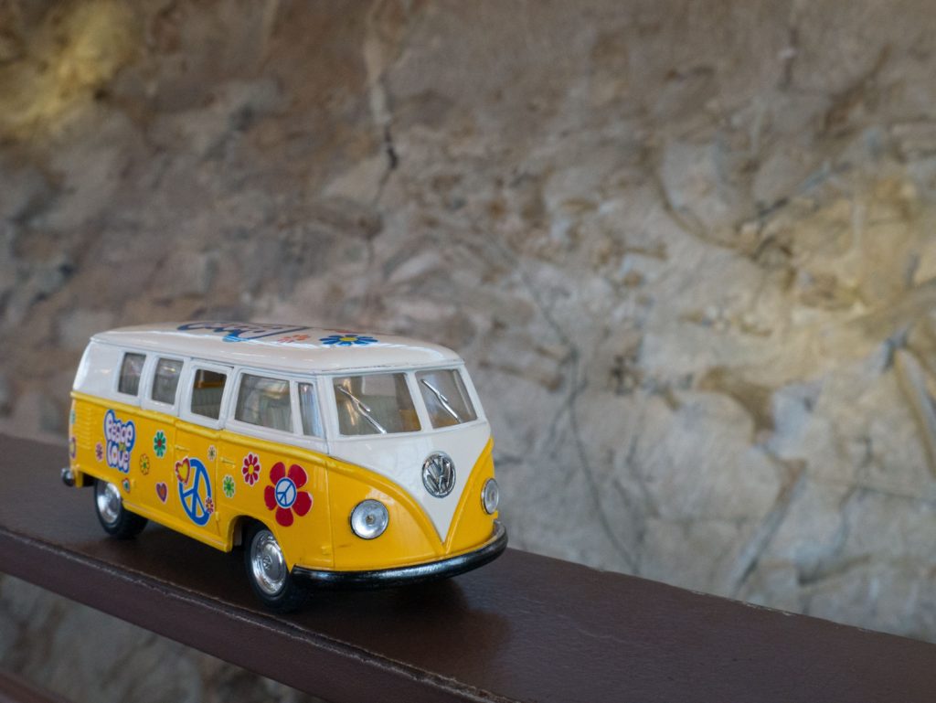 yellow van at the quarry fossil wall at Dinosaur National Monument
