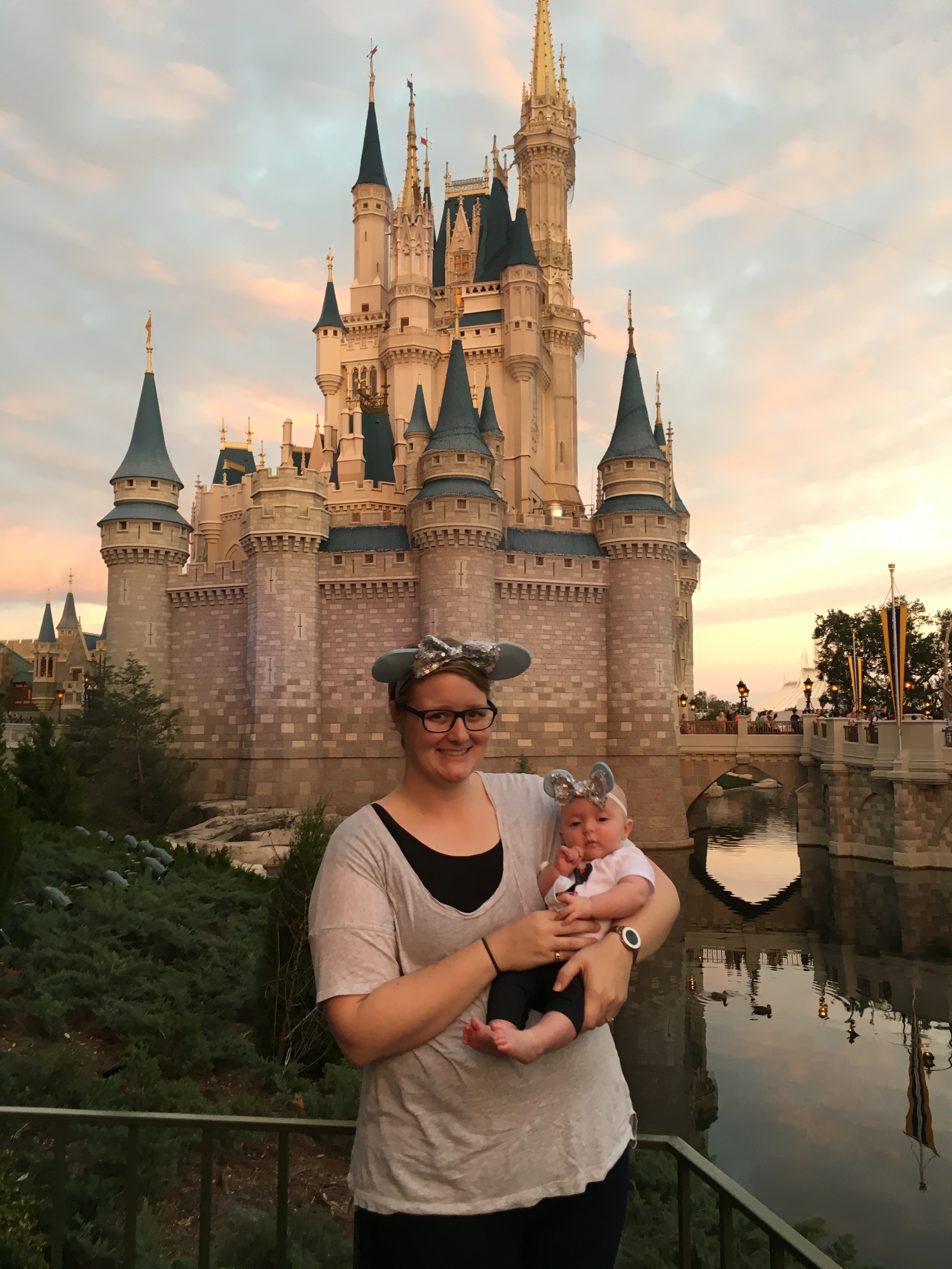 Meagan and baby at the Magic Kingdom Castle