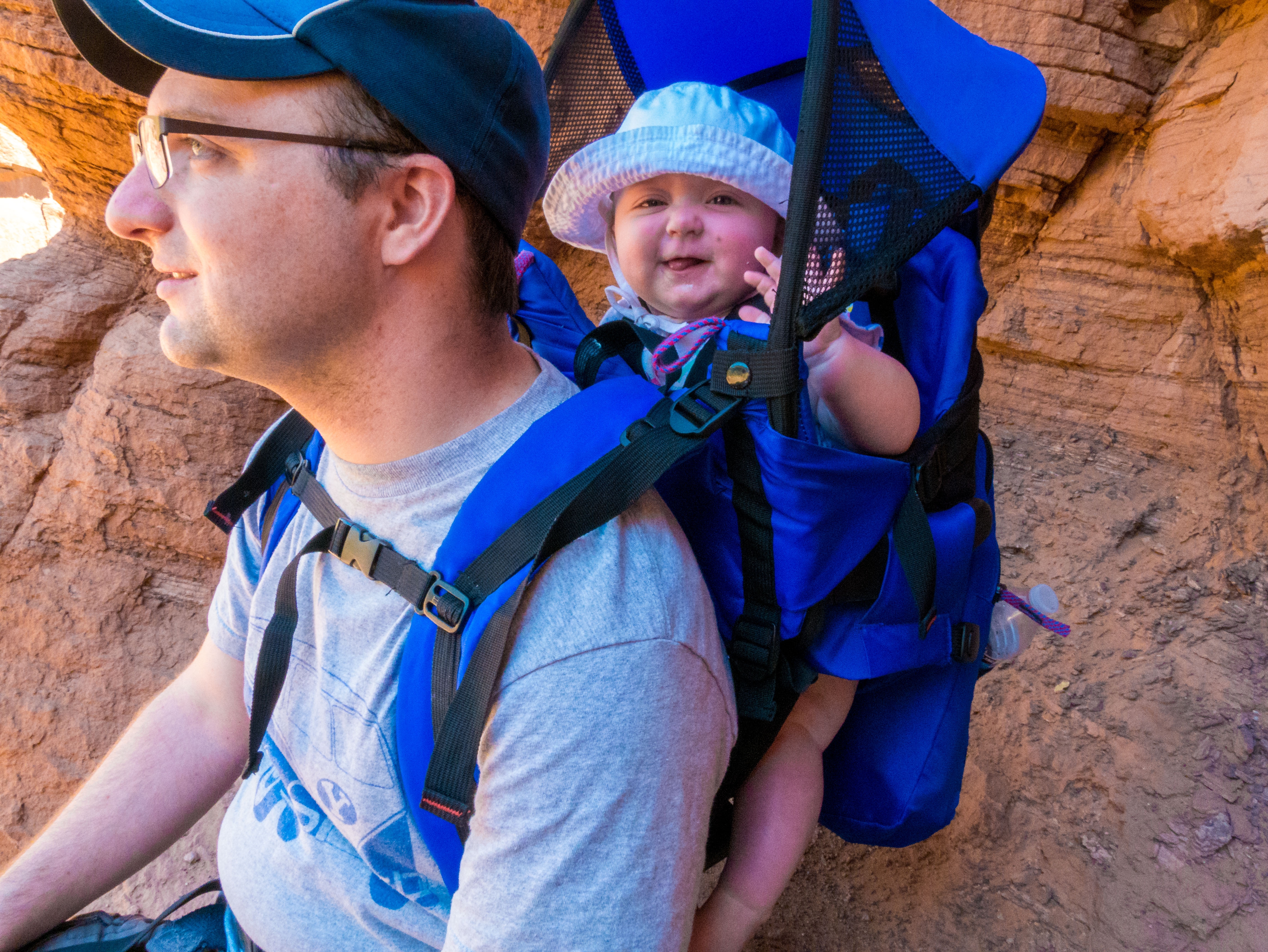 Ben and Baby sitting in the shade on the Watchman Trail at Zion National Park