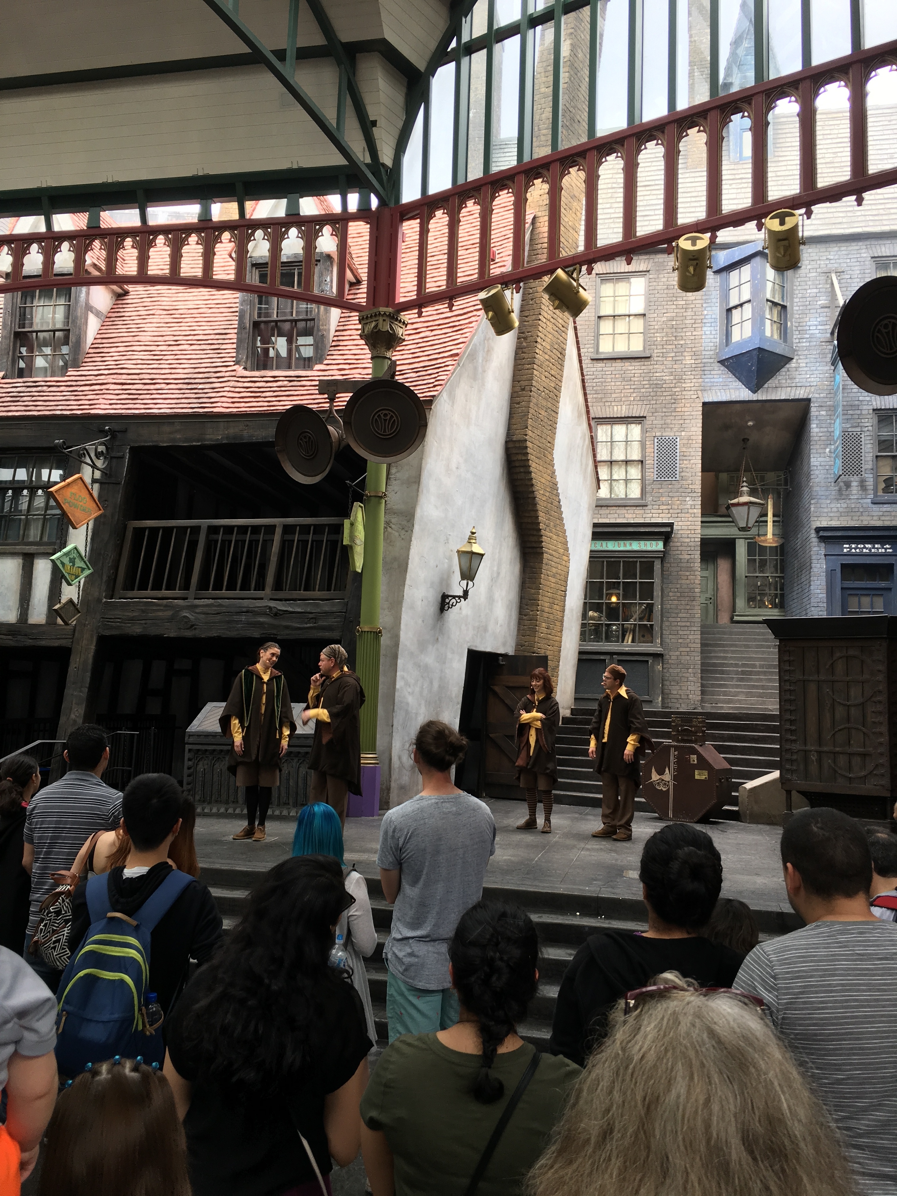 performers doing the tale of the three brothers in Diagon Alley