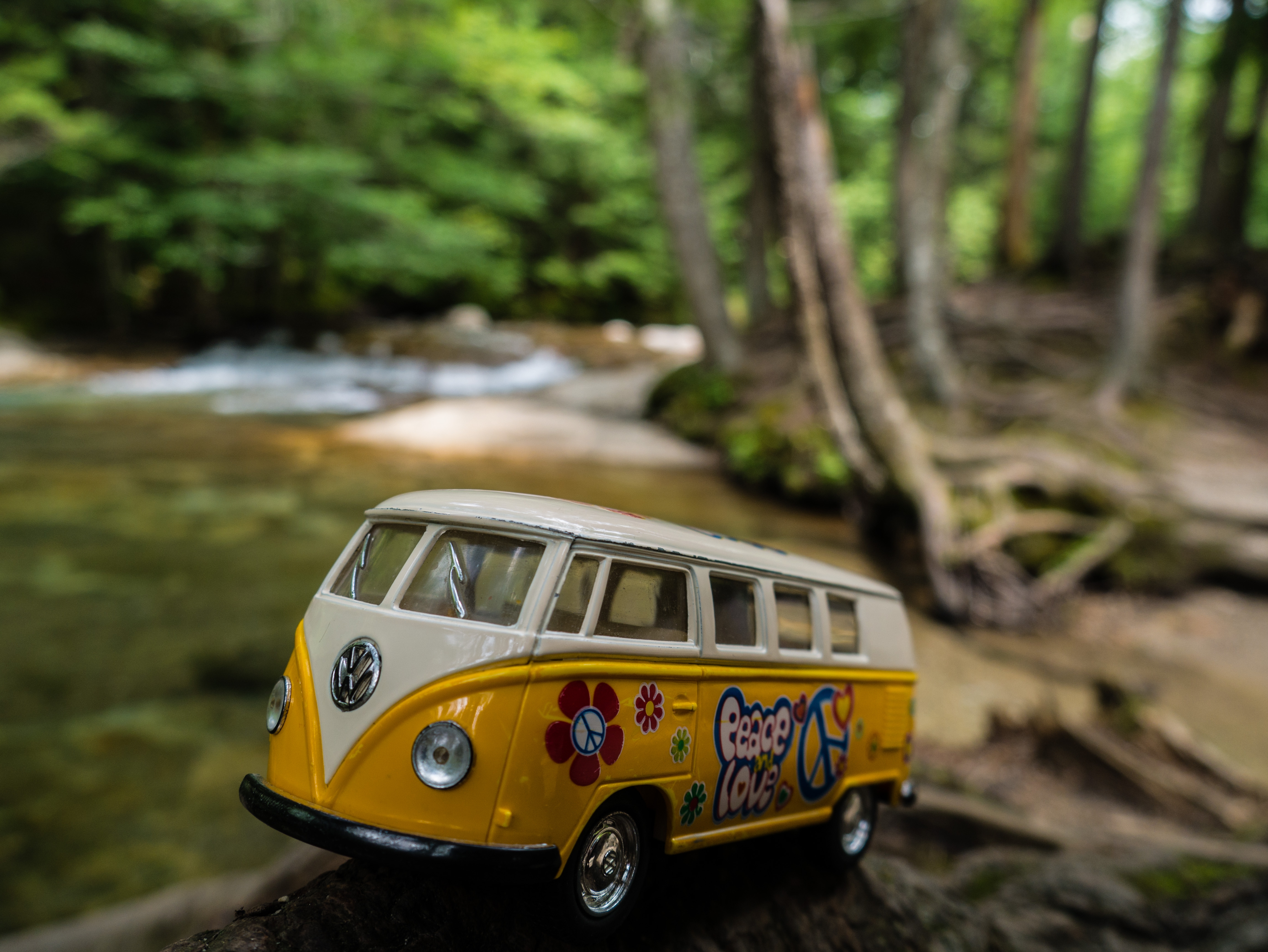 The Yellow Van by A river in Franconia Notch on the way to the Basin