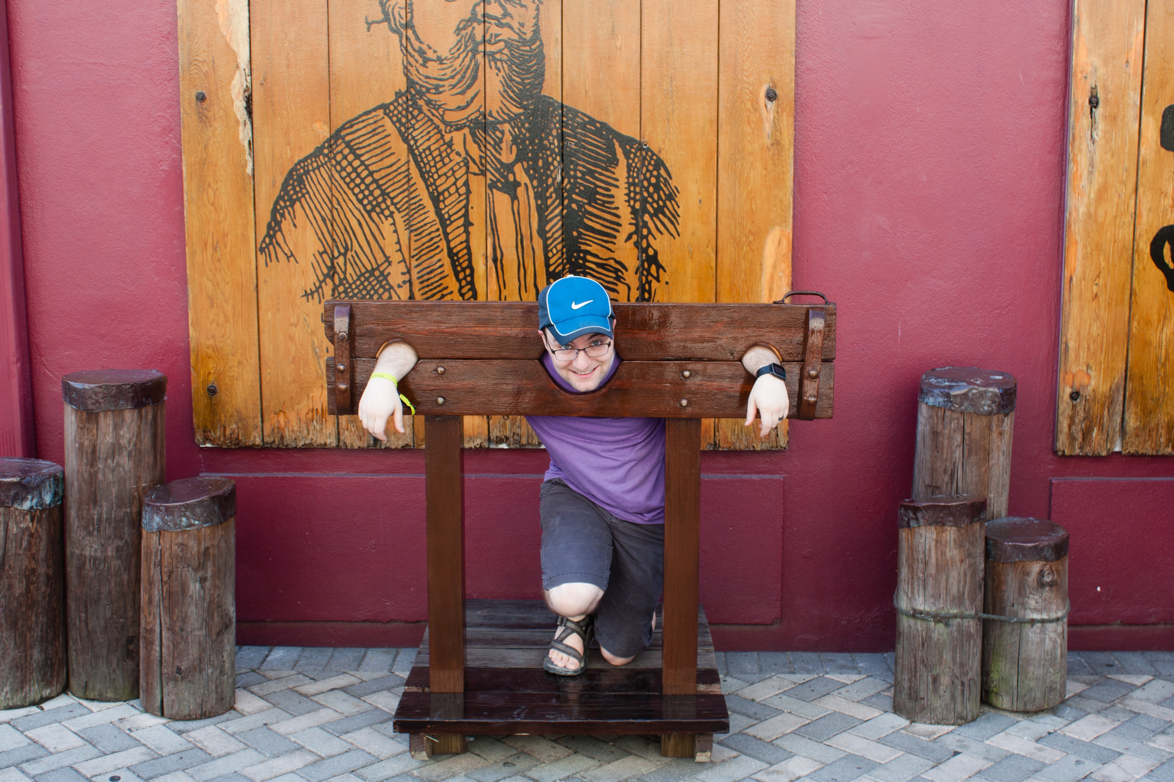 Ben in the stocks at the Pirates of Nassau museum